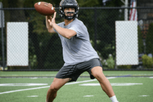 Tuckahoe quarterback Michael Annunziata looks downfield during the Tigers’ first preseason practice on Aug. 23, 2021. The fall sports season kicked off this week after coronavirus concerns put the campaigns in doubt.