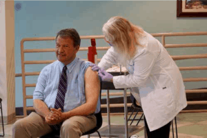 Latimer gets flu shot at county health clinic