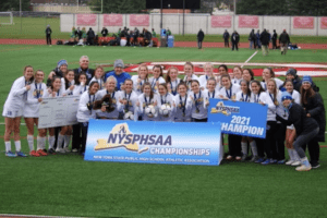 Bronxville’s girls soccer team celebrates winning the Class B state title in Cortland on Nov. 14, 2021. The Broncos topped Lewiston-Porter 2-0. Contributed photo