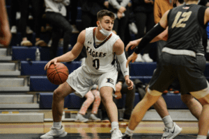 Frankie Provenzale looks for an open teammate against Nanuet on Feb. 22, 2022.