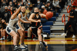 Sophia Colasacco drives along the baseline during Tuckahoe's game against Eastchester on Jan. 28, 2022. The Tigers rallied back from a 24-11 halftime deficit to top the Eagles 49-46. Photo/Mike Smith