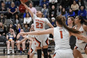 Angelina Mazzuoccolo hauls in a rebound during a game against Millbrook on March 8, 2022. 
Mazzucoccolo led Tuckahoe with nine points in a 65-28 loss. Photo/Mike Smith
