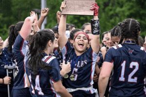 Eastchester celebrates its Section 1 championship on May 24. The Eagles are the first team to ever win a Section 1 title in Flag Football