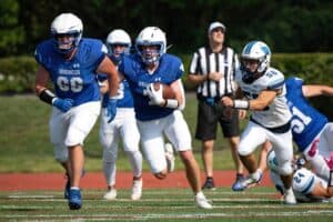 Brian Formato finds the open field in a Sept. 13 game against Westlake. Formato rushed for 262 yards and three touchdowns while adding an 80-yard touchdown reception as the Broncos scored 35 points in the second half to earn their first win of the year.