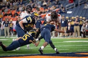 Connor Brice plows ahead for a touchdown in the Class D state finals on Dec. 5, 2025